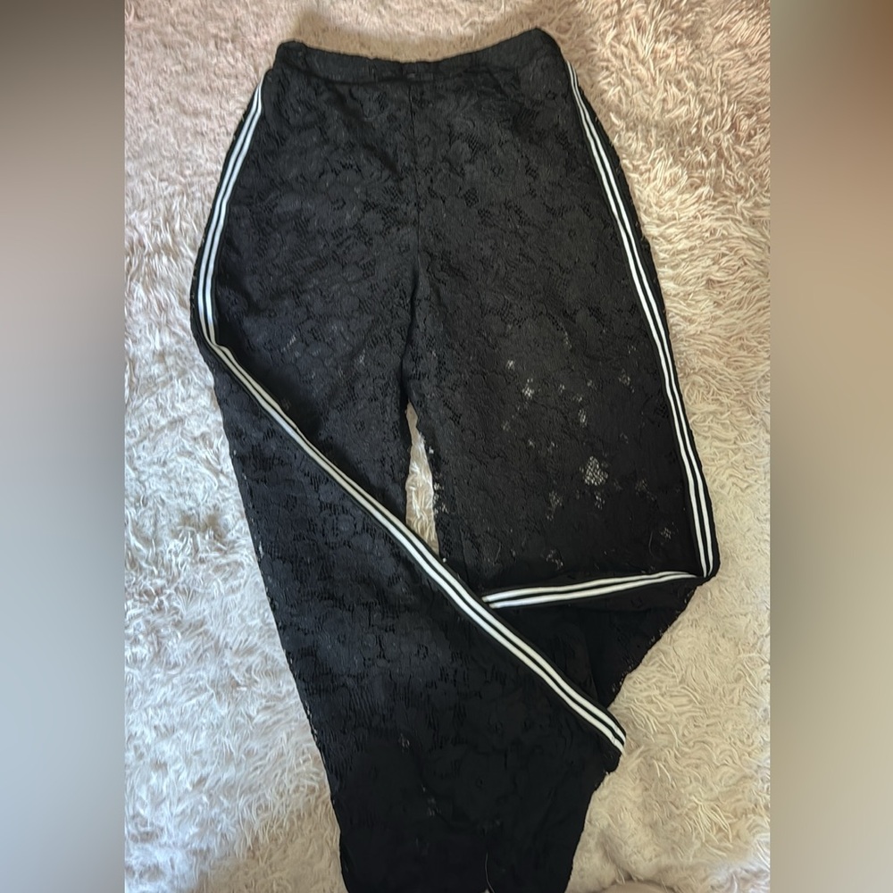 Boston Proper lace black pants with short and 2 white stripes in each side.